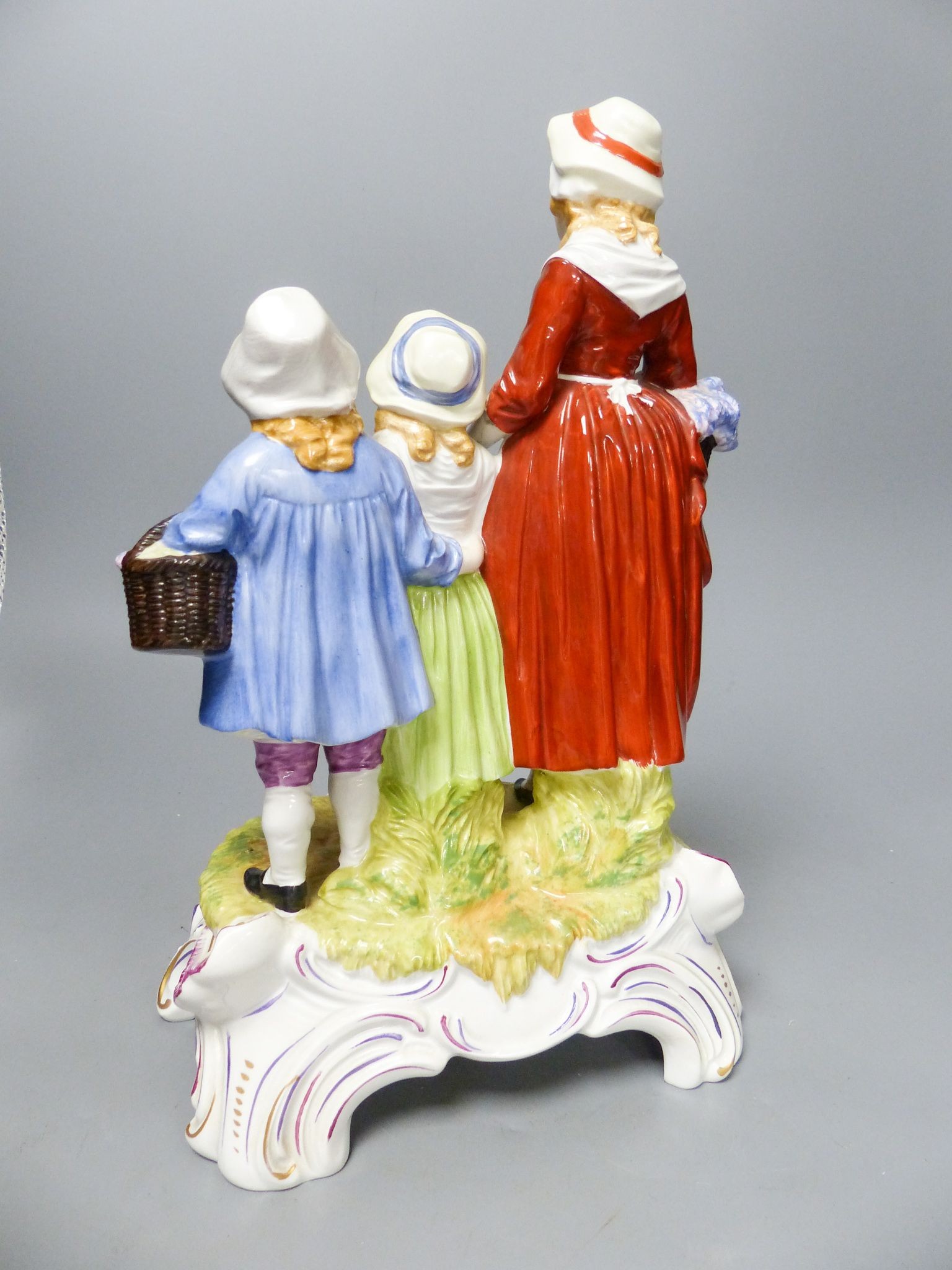 A Yardley's Old English Lavender advertising figure group, Dresden mark, 30 cm high